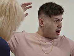 Busty granny in lingerie fucked in the kitchen by a stud