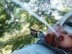 Peeing in the Park Behind a Tree