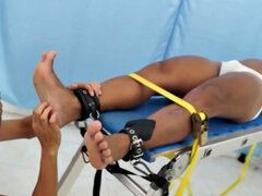 We strapped Hunter down on our tickling rack and released our sadistic ticklers Argie and Vahn on him. First was Argie.