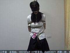 Black Silk Girl In Sailor Suit Blindfolded And Gagged