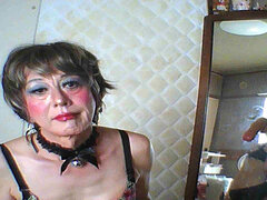 The Cross-dresser Puts a Glass Ball in Her Anus and Writhes