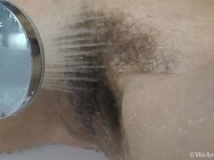 Foxy takes a sexy shower and masturbates in there