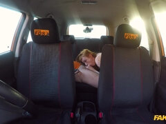 Tattooed redhead bimbo rides her driving instructor