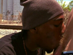 Amateur jock with tattoos takes a deep interracial pounding in public by a black top