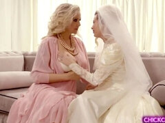 Lesbian MILF surprises her bride dauther with a hot pussy licking session before her wedding day.