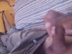 Intimate closeup of a big cock solo and cum tribute