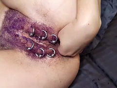 Hairy purple pierced pussy gets anal fisting and squirting