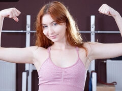 Aesthetic redhead angel Noi Freja sticks a dildo in her pink hole