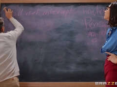 Frisky teacher Bella Rolland fucks by the desk