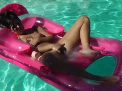 Amazing brunette masturbates in a pool for you