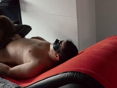 Passionate lovemaking session between partners in their own cozy space