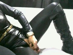 Wifey in leather gives an intense handjob with long nails