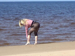 Funny MILF with Nylon Ass and Tits on Beach