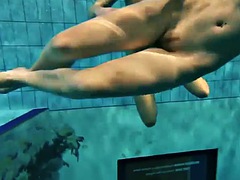 Two sexy amateurs showing off their bodies underwater