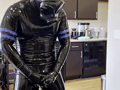 Rubberdrone jerks off in latex socks