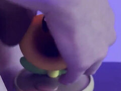 Hot Glue Covering Toy Figure in Cum