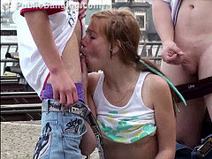 Facial cum on cute young blonde teen woman in public fuck-fest gang bang 3 way orgy