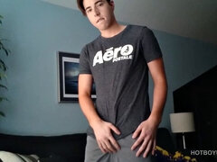 Cole Summers strips and shows off wood, loving every minute. He's on his feet, displaying his assets and stroking his big dick.