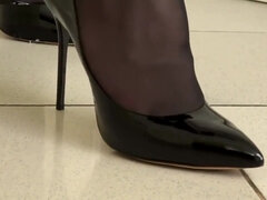 Lena crushing roaches in sharp heels.