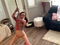 Raver nymph gets bare, spreads pussy on pole and dirty dances