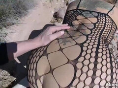 blonde PAWG Angie gives POV blowjob in fishnet bodysuit outdoors