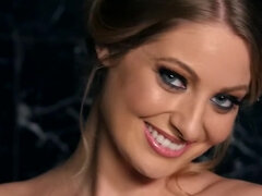 While taking a bath lovely blonde is playing with her wet pussy