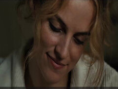 Blonde celebrity Riley Keough gets naughty in public with a topless bra-clad scene