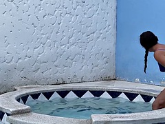 Latin couple gets horny in the pool and ends up fucking outside