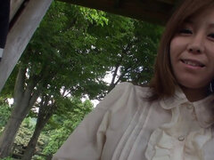 Elegant MILF spreads her pink pussy in the outdoors