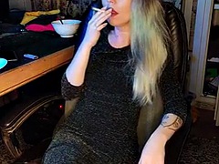 Adult stepdaughter smokes a cigarette