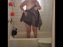 Hot granny Momma Vee takes a shower at her stepbrothers house!