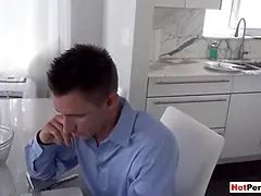 Busty MILF stepmother blows her stepson next to stepdad