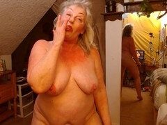 Silver-haired beauty Dawnskye55 fingers herself to orgasm, stripped to the waist