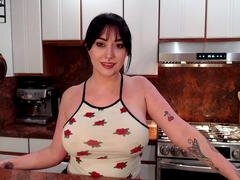 Oiled up Allesandra Snow with her big natural boobs getting pounded in the kitchen