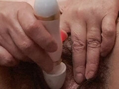 Masturbating with Vibrator on Mature Clitoris