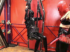 Cybill Troy dominates rubber sub with fisting and strap-on anal pounding