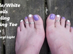Purple and White Toes Wiggling Wearing Toe Rings