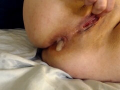 Naughty amateur girl gives herself an intense anal creampie with a massive ten-inch dildo