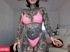 Slutty tattooed mom Melody Radford tries on sexy micro bikinis and Easter Bunny lingerie
