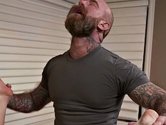 Tattooed bear stepdad bareback fucks stepsons asshole in bed