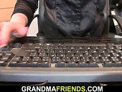 Redhead business lady swallows two big cocks