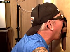 Gloryhole mature gay in amateur video sucks rod to face