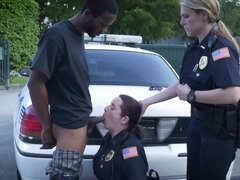 Black amn is banging two slutty female cops outside