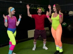 Fitness instructor and two babes are having 3some in the gym