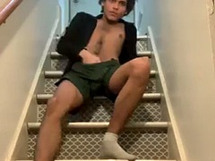 Masturbating with a dirty sock and showing her ass on the stairs