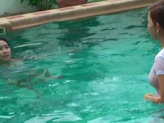 Having fun in the pool with my two best friends