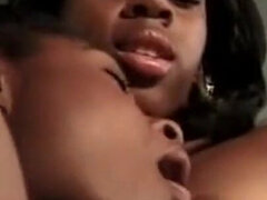 Two Young Black Lesbians with Nice Tits Lick Each Other's Pussy and Enjoy