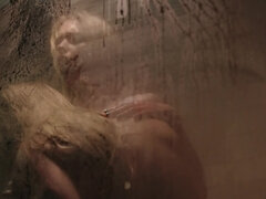 Busty blonde takes shower and girlfriend joins to have sex