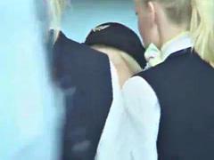 Busty blonde flight attendant jerks off Asian dude in public