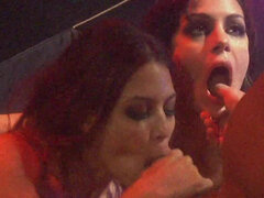 Two whores Angelina Valentine and Ryder Skye munch on a cock in the club